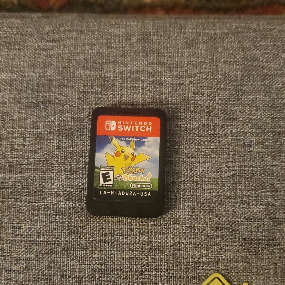 Nintendo Switch Pokémon Let's Go Pikachu Game Card - Black and Yellow